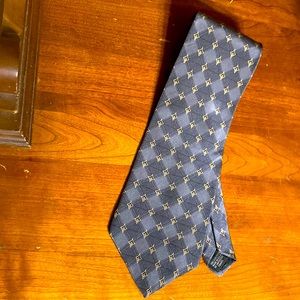 Graham and Lockwood. Brand new only worn once. Gray and gold